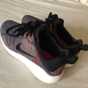 Women’s Nike Roshe premium sneakers.